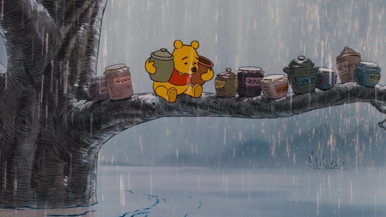 Pooh holds honey in storm