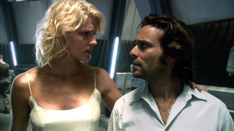Number Six and Gaius Baltar looking at each other on Battlestar Galactica