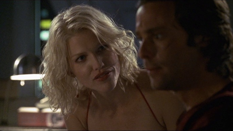 Number Six and Gaius Baltar looking at each other on Battlestar Galactica