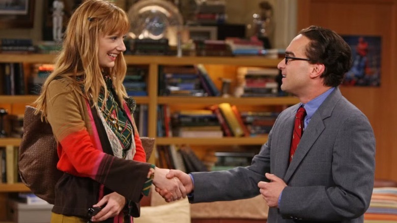 Elizabeth and Leonard shake and speak