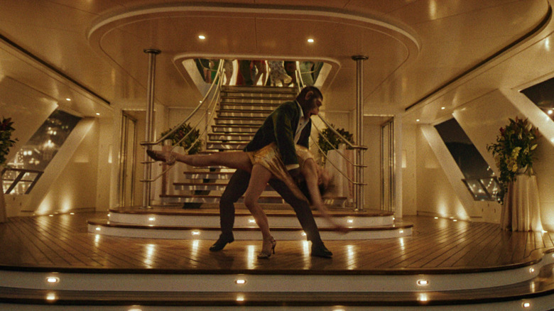 Robbie Williams as an ape dancing with Nicole Appleton in Better Man