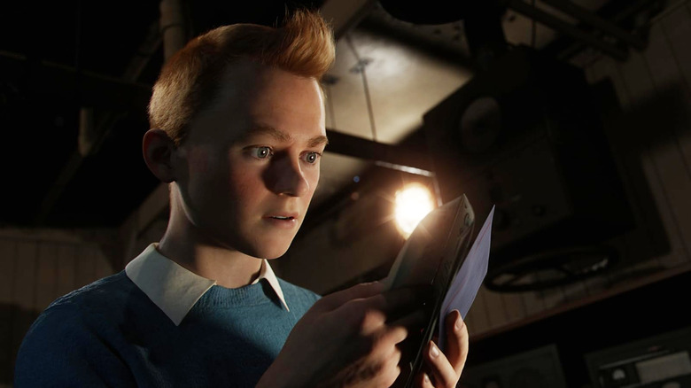 Tintin analyzing a map in The Adventures of Tintin