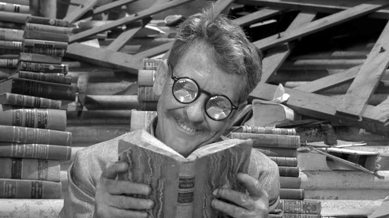 Burgess Meredith's Henry Beamis happy reading a book in Time Enough at Last