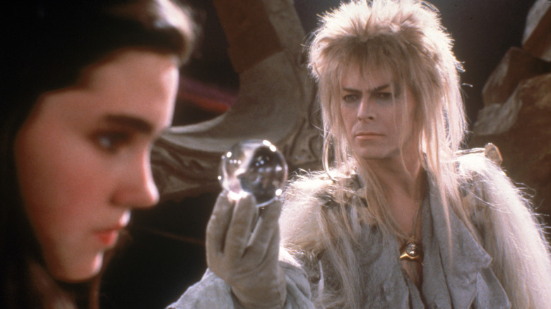 Jareth holding a crystal ball in 