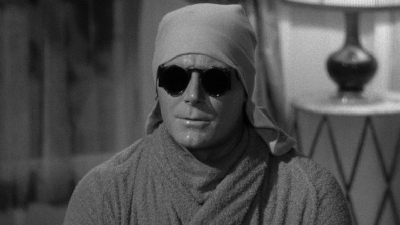 Frank Griffin wearing face makeup and sunglasses in Invisible Agent