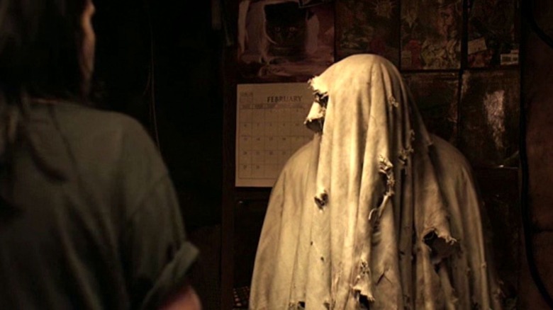 A ghost covered with a blanket in Housebound