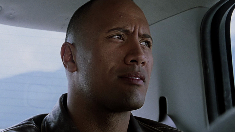 Chris Vaughn, Jr. sitting in a car in Walking Tall