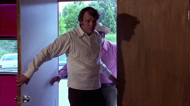 Sheriff Buford Pusser entering a room in Walking Tall