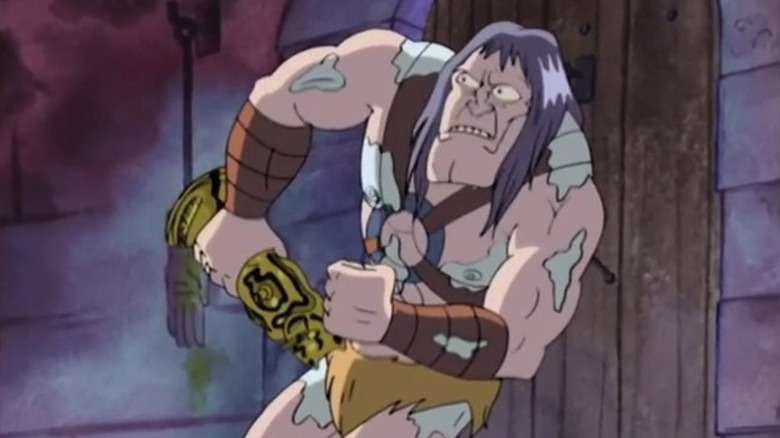 Korgoth with a statue trying to break down a door in Korgoth of Barbaria