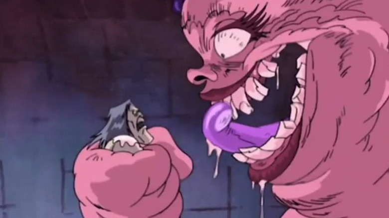 A big slimy pink monster about to eat Korgoth in Korgoth of Barbaria