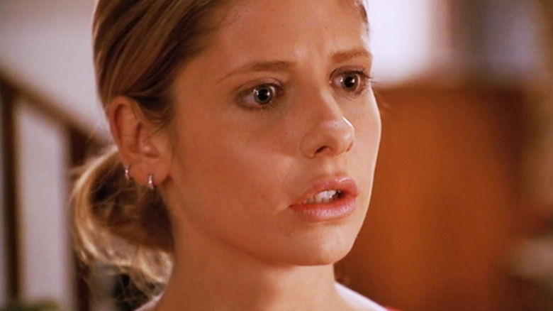 Sarah MIchelle Gellar's Buffy Summers looks shockec in closeup in Buffy the Vampire Slayer