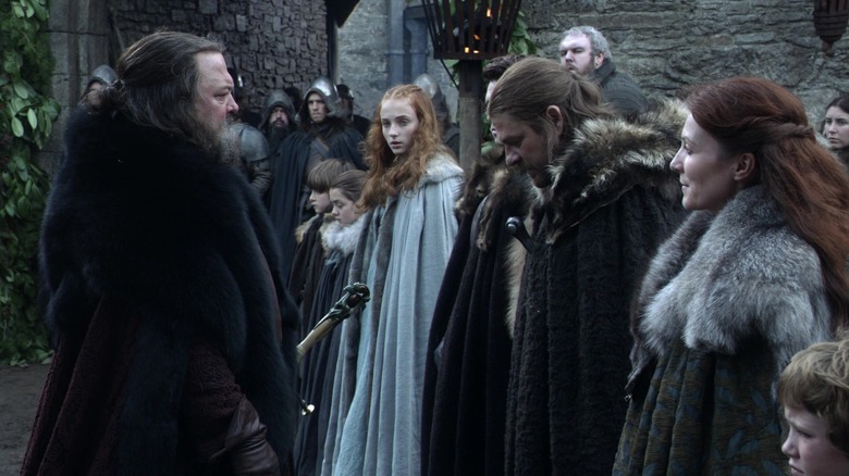 The entire Stark house (minus Jon) lining up for the King's arrival in Game of Thrones