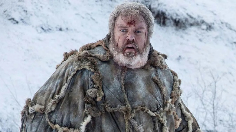 Hodor in the snow looking bruised and frightened in Game of Thrones