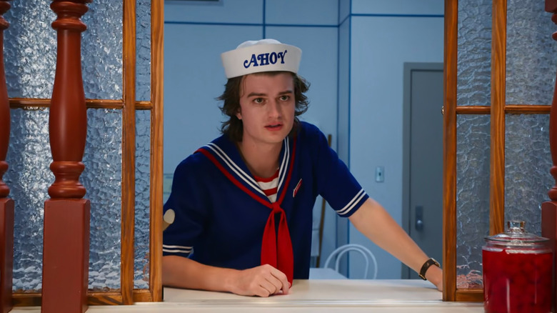 Steve Harrington in his Scoops Ahoy outfit in Stranger Things