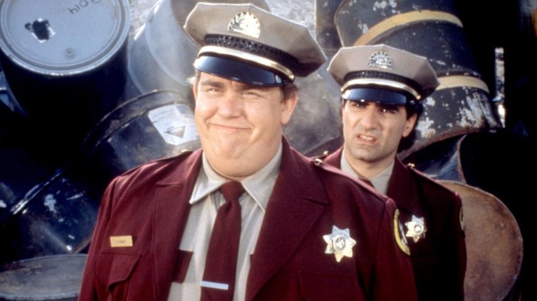 John Candy as Frank Dooley and Eugene Levy as Norman Kane are stuck guarding a toxic landfill in Armed and Dangerous