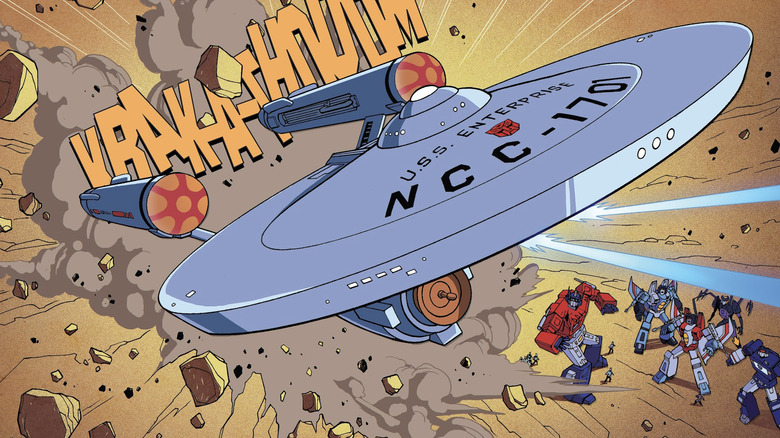 Star Trek vs. Transformers -- the Enterprise bursts out of cave as Optimus Prime, Spock, Thundercracker, Starscream, Airachnid and Soundwave look on from the ground