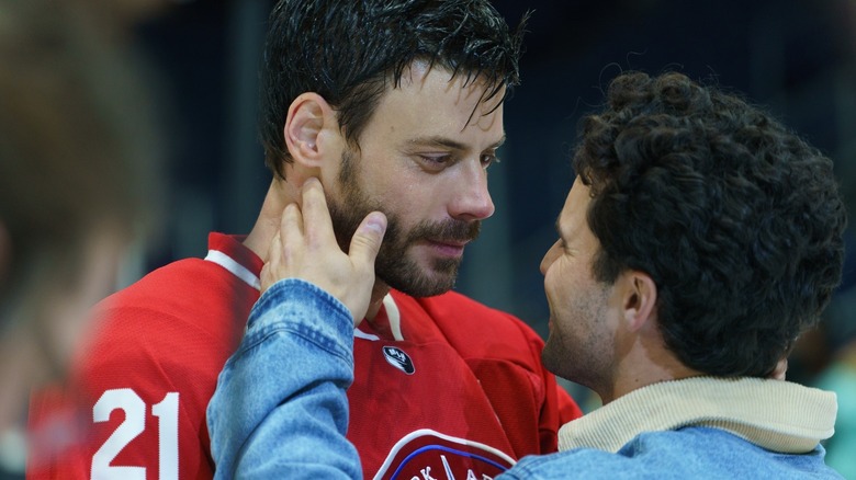 Kip touching Scott's face tenderly on the ice in Heated Rivalry