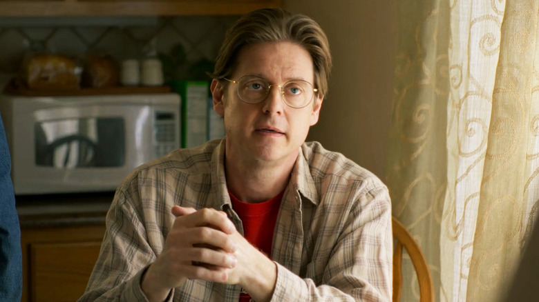 Tim Heidecker's Howard sits in his kitchen in Y2K