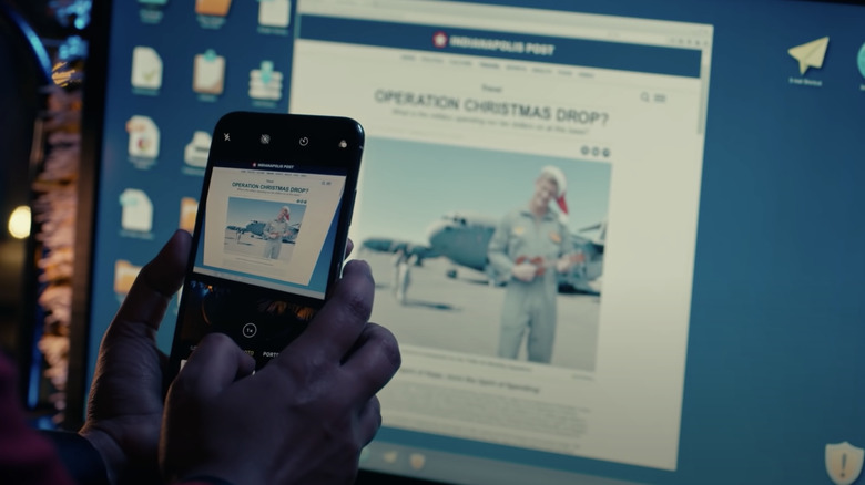 A shot of the news report from Operation Christmas Drop