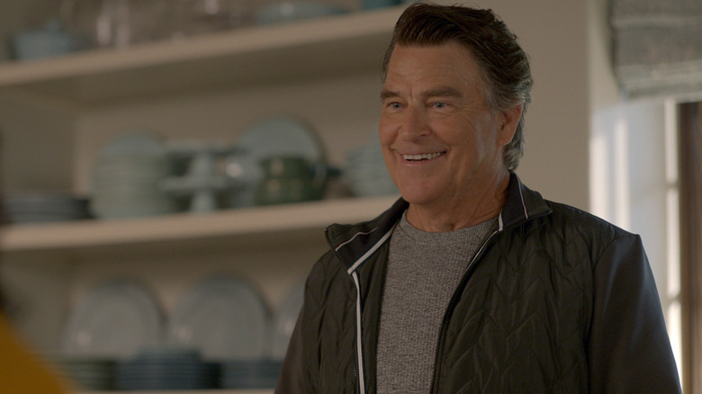 Ted McGinley as Derek smiling in Shrinking