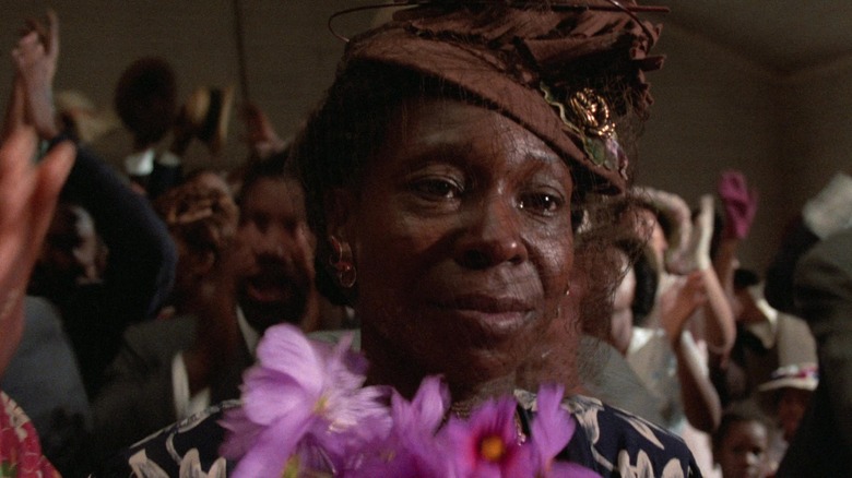 Whoopi Goldberg as Celie attending church in The Color Purple
