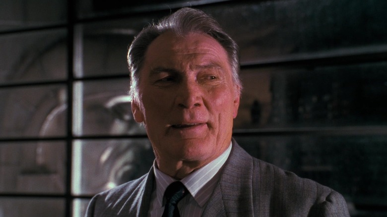 Jack Palance's Carl Grissom smiles slyly in Batman