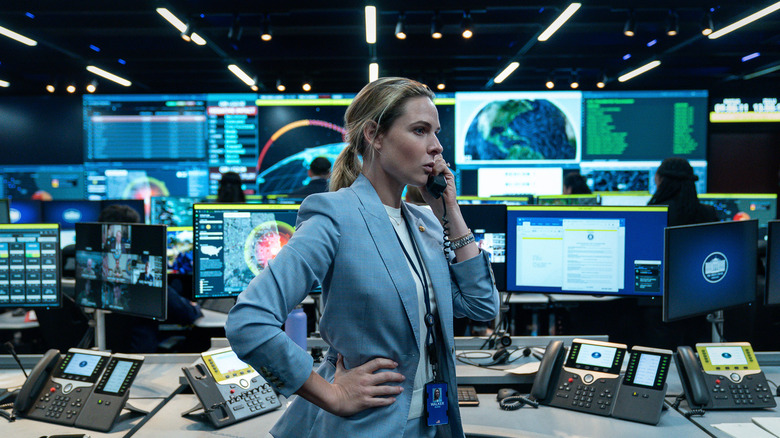 Captain Olivia Walker on the phone in the Situation Room in A House of Dynamite