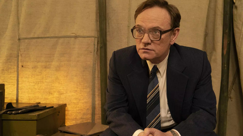 Jared Harris as Valery Legasov sits in a tent in Chernobyl