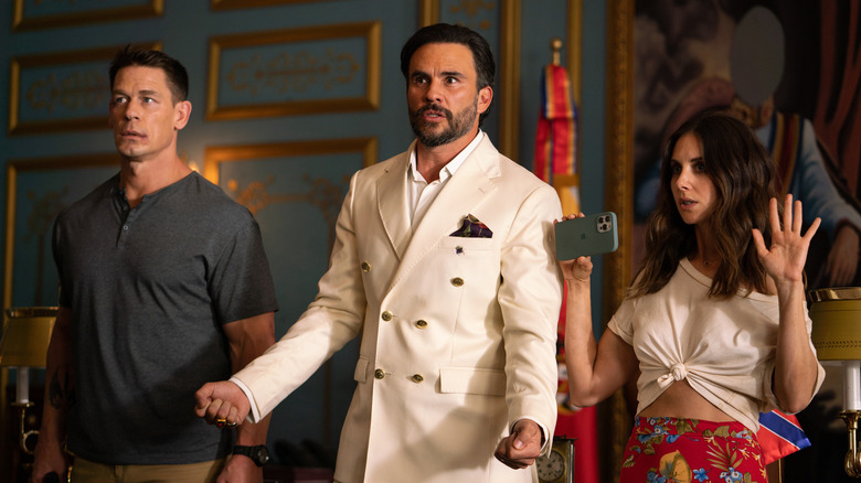 Claire, Mason and President Juan stand next to each other in an independent