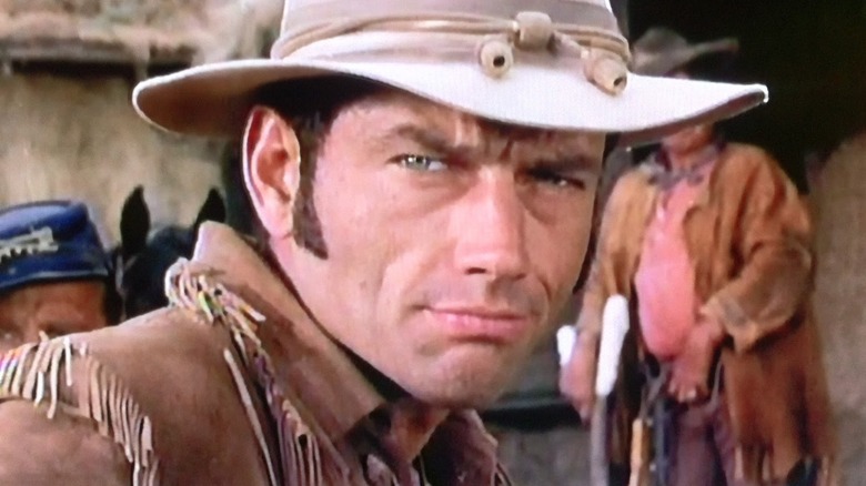 Ralph Taeger raising an eyebrow as Hondo Lane in Hondo
