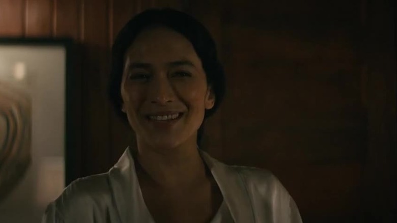 Gabby smiling in a cabin in Severance