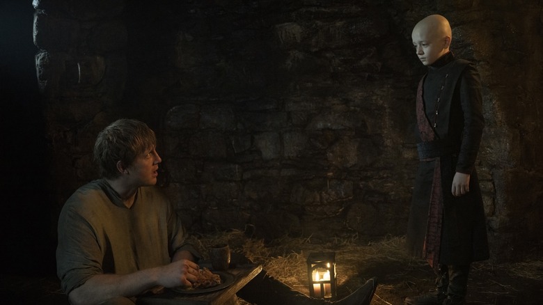 Egg talking to a surprised Dunk in a jail cell in A Knight of the Seven Kingdoms