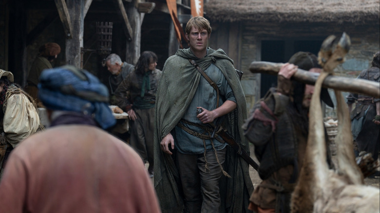 Ser Duncan the Tall walking down a bustling street in A Knight of the Seven Kingdoms