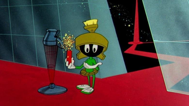 Marvin the Martian holding a sparkling stick of dynamite in Hare-Way to the Stars