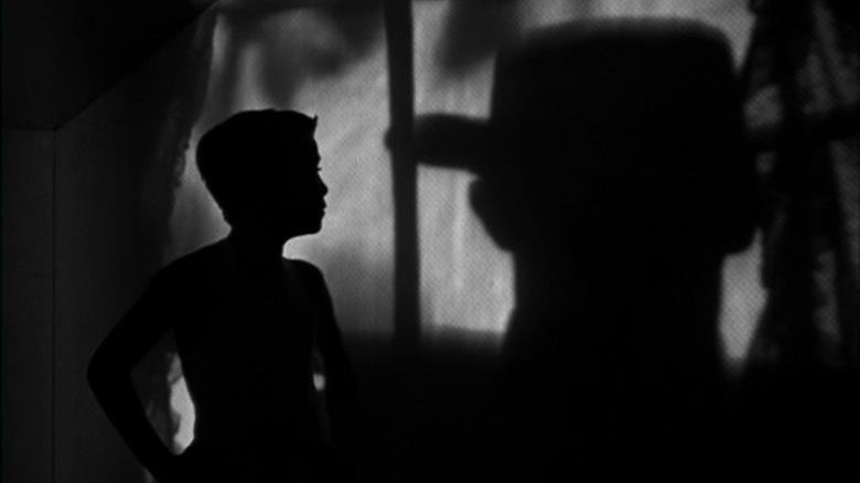 night of the hunter boy and preacher's shadow