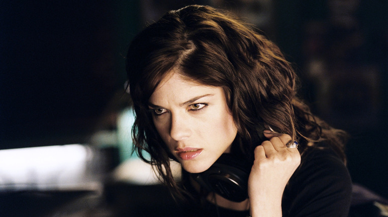 Selma Blair as Stevie with a distressed look on her face at the radio station in The Fog (2005)