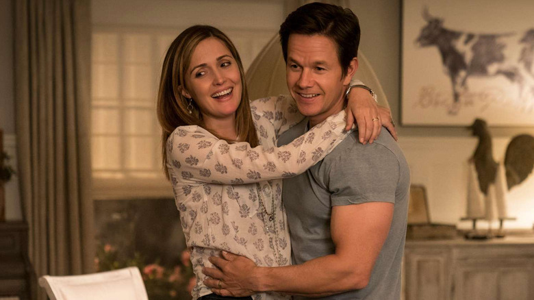 Mark Wahlberg as Peter Wagner and Rose Byrne as Elinore Wagner hugging in Instant Family