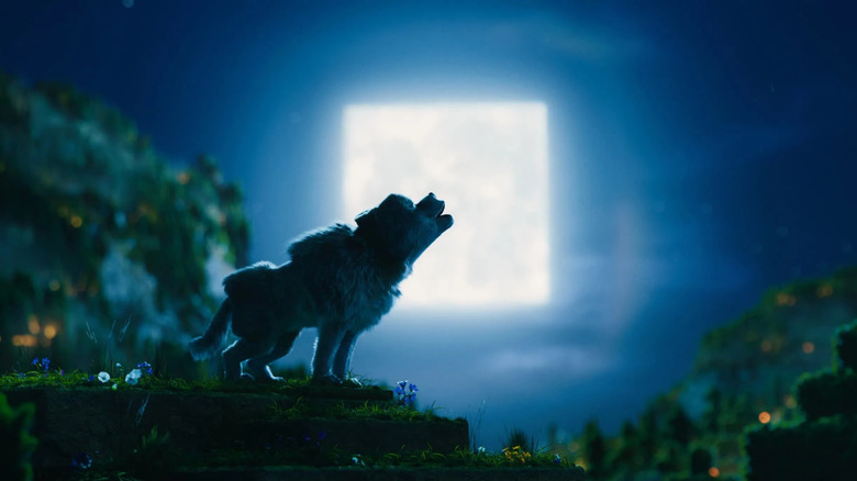 Dennis, howling at the square moon in A Minecraft Movie.