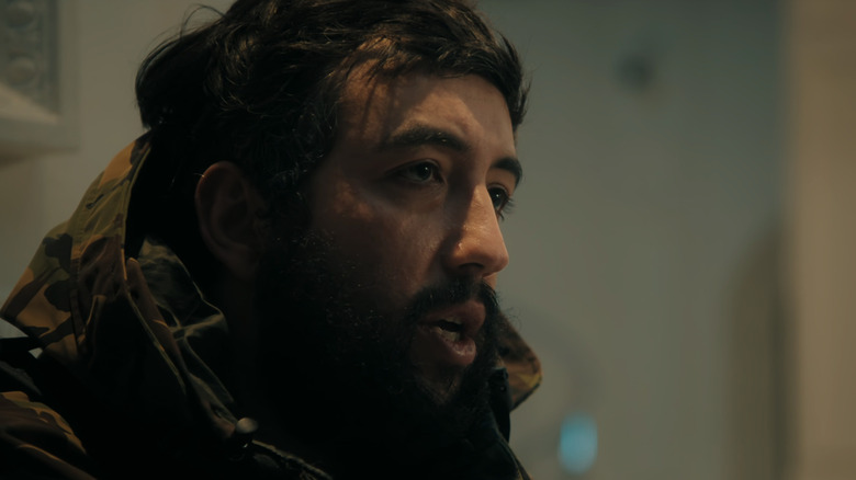 Soufiane Moussouli's Ammar Ajar looks across frame in iHostage