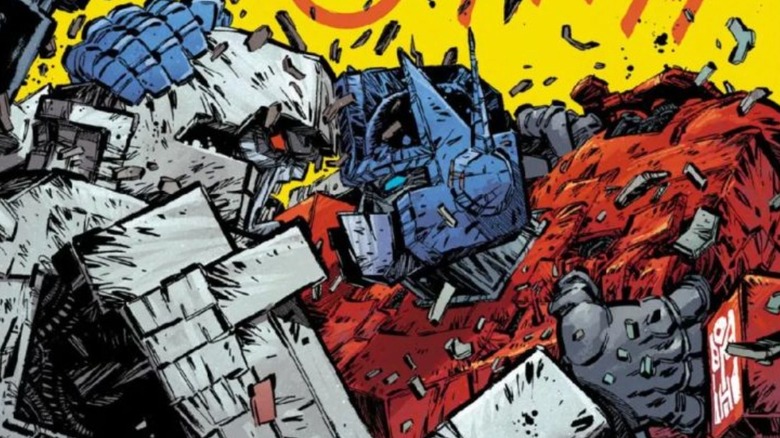 Optimus Prime and Megatron locked in battle in Transformers #24
