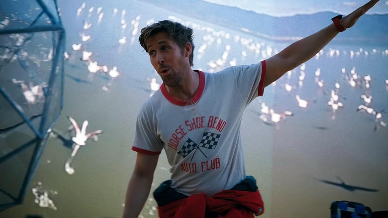 Ryan Gosling as Ryland Grace running with his arms out in a simulation of a beach in Project Hail Mary