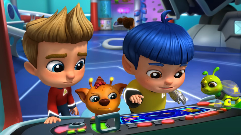 JR and Sprocket at a control panel in Star Trek: Scouts