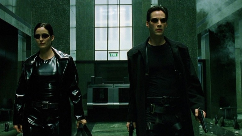 Carrie-Anne Moss and Keanu Reeves in The Matrix