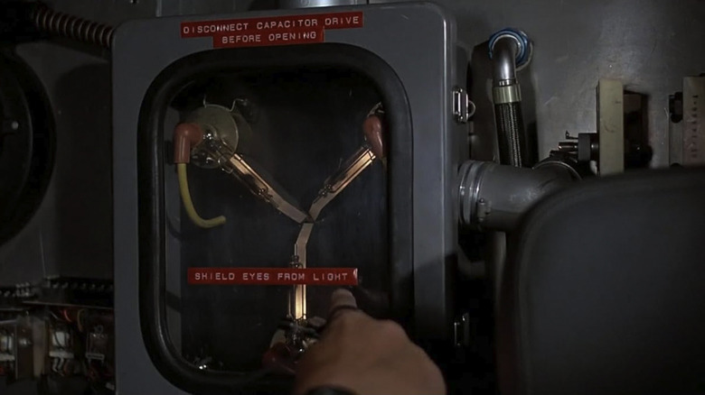 Doc points at the Flux Capacitor in Back to the Future