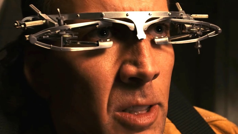 Cris Johnson with a contraption strapped to his eyeballs in Next