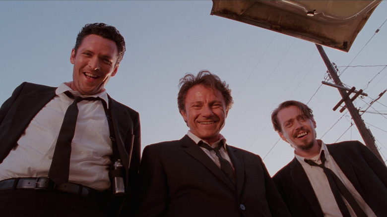 Michael Madsen as Mr. Blonde, Harvey Keitel as Mr. White, and Steve Buscemi as Mr. Pink in Reservoir Dogs