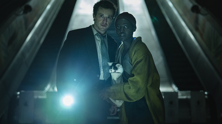 Lupita Nyong'o and Joseph Quinn in a subway station in A Quiet Place: Day One