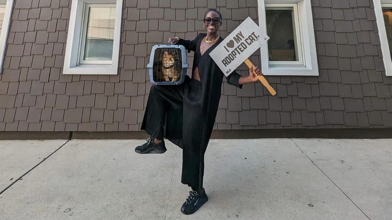 Lupita Nyong'o holding her cat Yoyo