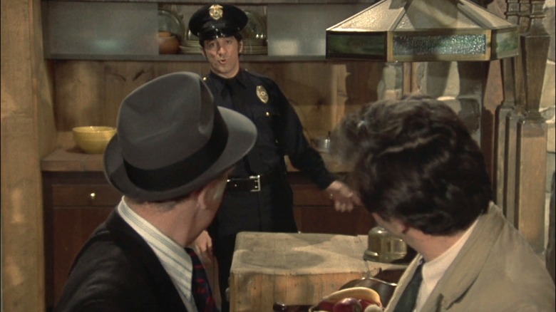 David Touma as a police officer in Colombo