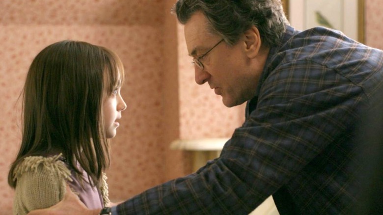 Robert De Niro's David comforting Dakota Fanning's Emily in Hide and Seek